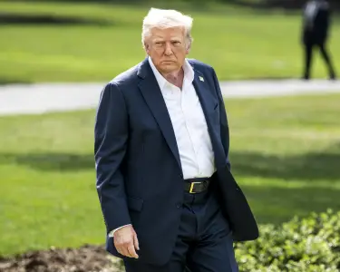 Dow drops nearly 300 points after Trump teases 35% tariff on Canada, new threat to EU