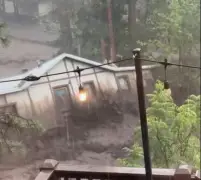 New Mexico mountain village braces for more rain following deadly flash flooding