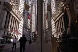 Wall Street points lower after Trump’s weekend tariff announcement; bank earnings this week