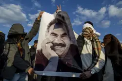 Kurdish fighters in northern Iraq to hand over weapons in first step toward disarmament