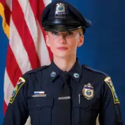 Cop was shot by fellow officer after fiancé said he feared she would kill their baby son